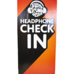 Retractable Headphone Check-In Standing Banner